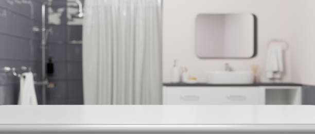 istock Empty white tabletop for montage your product over blurred modern bathroom interior 1341804515
