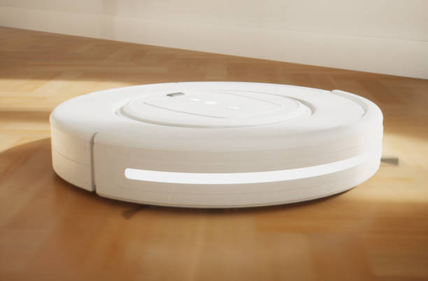 istock Robot vacuum cleaner cleaning the house 1341806901