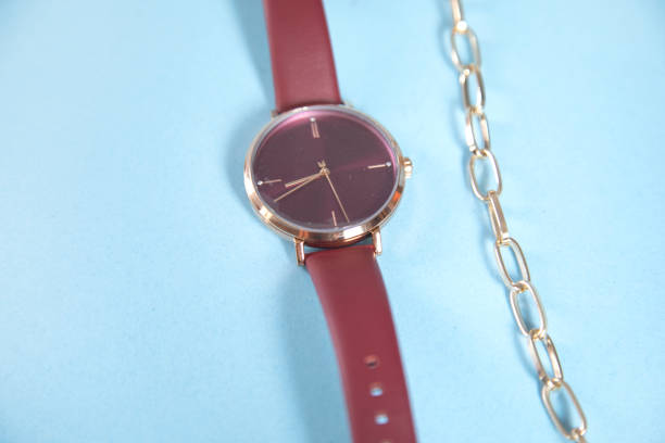 istock necklace with watch on table 1341807122