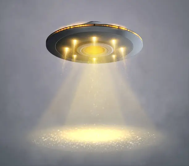 Vector illustration of UFO spaceship with light beam