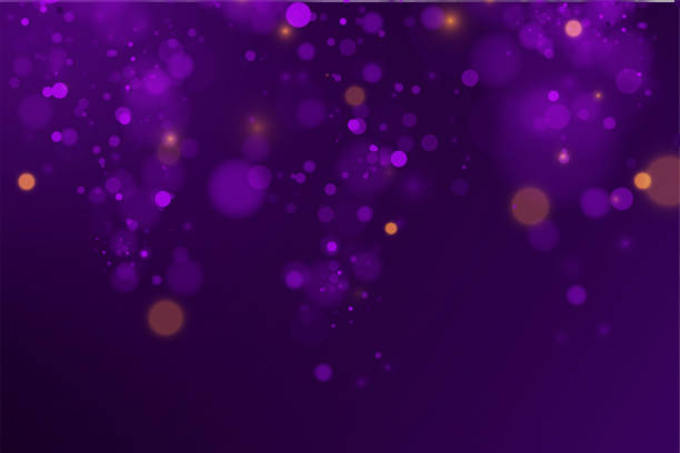 istock Festive purple and golden luminous background with colorful lights bokeh 1341810429