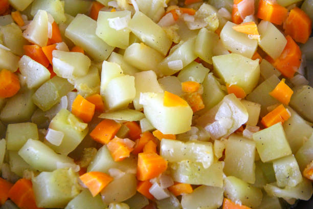 istock Zucchini with and onion carrots, food background 1341814177