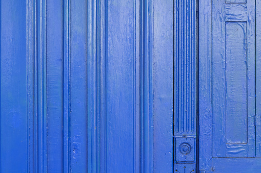 Bright blue wooden wall.