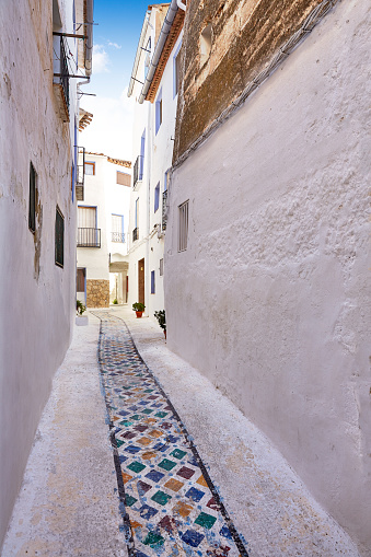 Chelva village street in Valencia of Spain Mediterranean whitewashed walls