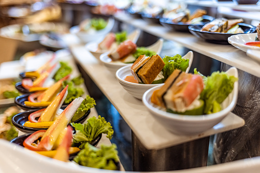 Variety fish dishes served buffet lunch. Healthy seafood dinner restaurant buffet menu