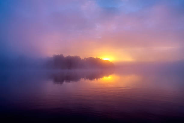 istock Misty sunrise over lake in Sweden 1341826572