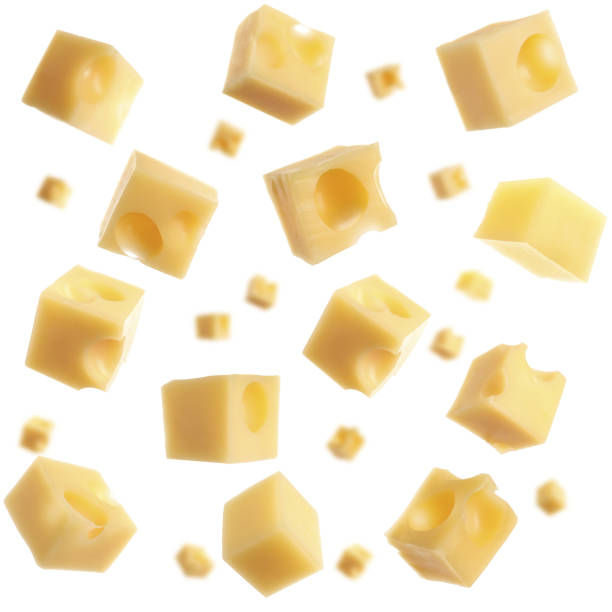 istock Collage with cubes of cheese falling on white background 1341826575
