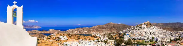 Photo of Picturesque authentic Ios island. View of scenic old town Chora with whitewashed houses and churches