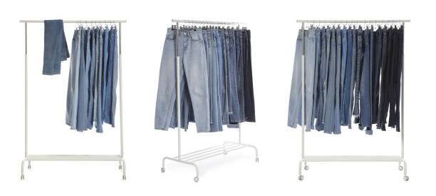 istock Set with racks of different jeans on white background. Banner design 1341829067