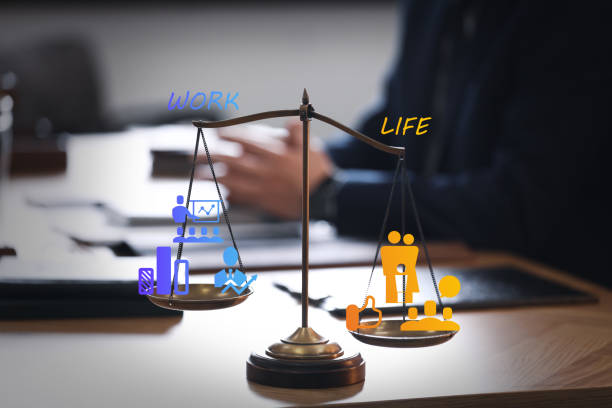 istock Work-life balance concept. Scale with images on table 1341829139