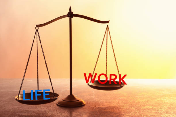 istock Work-life balance concept. Scale with words on table 1341829142