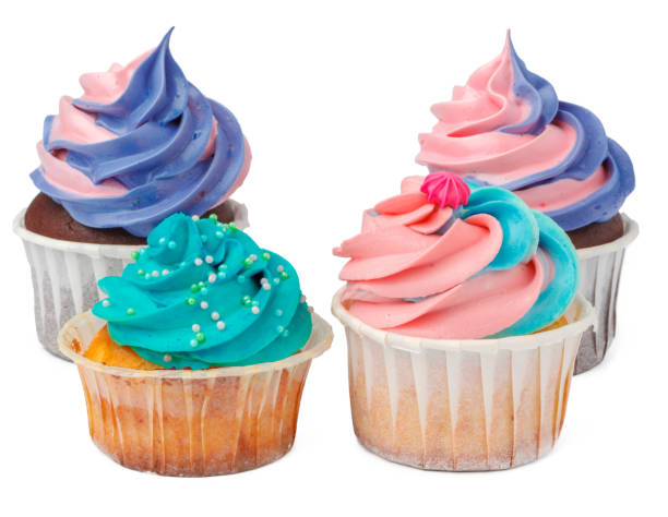 istock Group of cupcakes with colored topping isolated on white background 1341829231