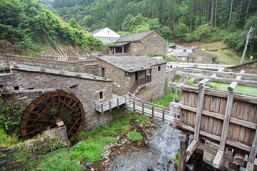 asturias, taramundi, spain - july 28, 2021. museum of the mills of mazonovo. ethnographic exhibition of old water mills located in a forest in asturias, spain.