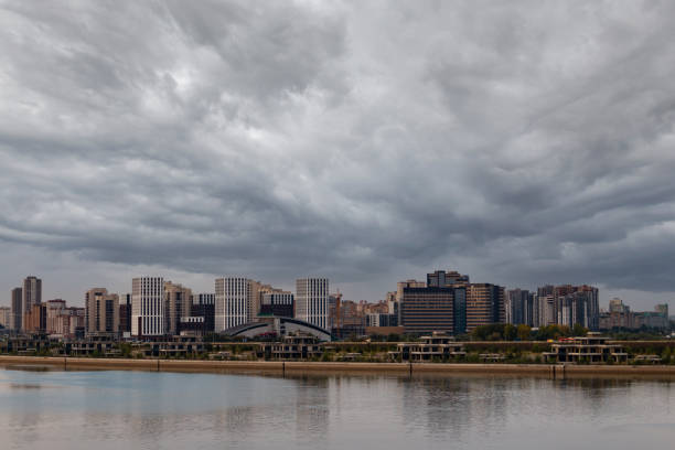 istock City view with buildings and reflection on river 1341830447