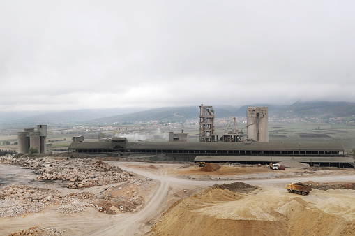 heavy machines behand concrete factory