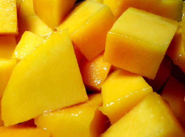 istock Mango diced on the skin closeup square composition 1341837784