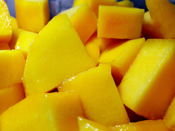 istock Mango diced on the skin closeup square composition 1341837788