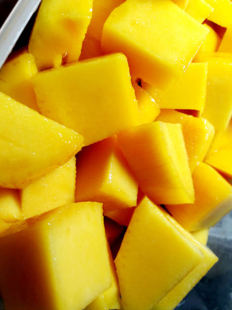 istock Mango diced on the skin closeup square composition 1341837792
