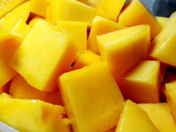 istock Mango diced on the skin closeup square composition 1341837793