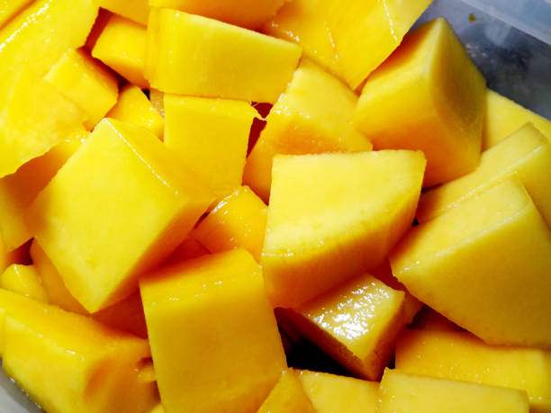 istock Mango diced on the skin closeup square composition 1341837799