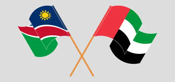 Vector illustration of Crossed and waving flags of Namibia and the United Arab Emirates