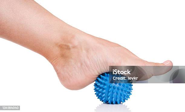 Womans Foot With Massage Ball Stock Photo - Download Image Now - Sole Of Foot, Adult, Alternative Therapy