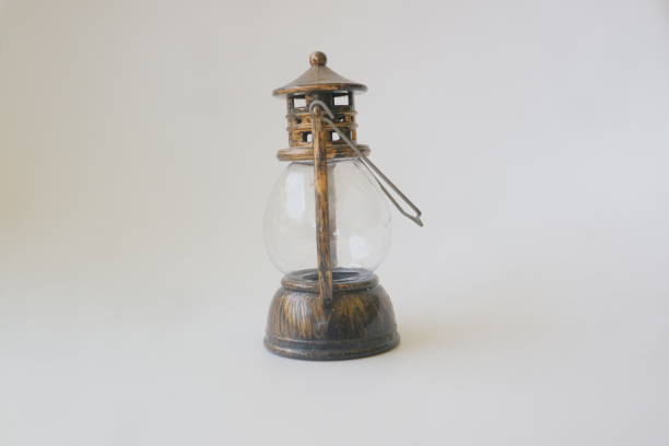 istock Miniature brown lantern on white isolated background photo 1341842801