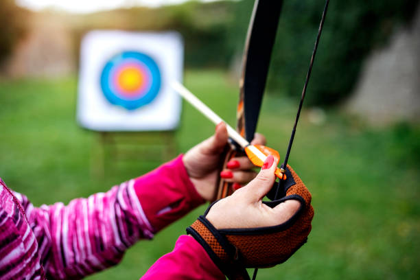 istock A woman on an archery field 1341848901