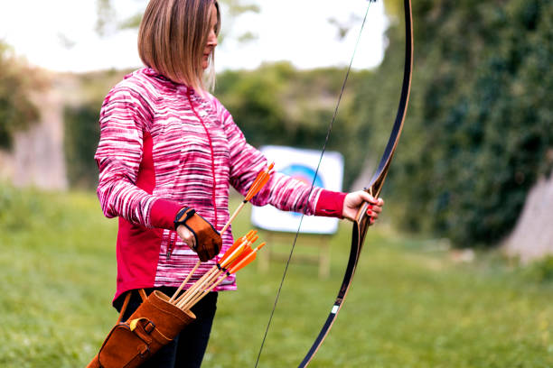 istock A woman on an archery field 1341848904