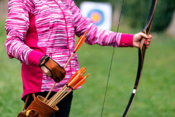 istock A woman on an archery field 1341848993
