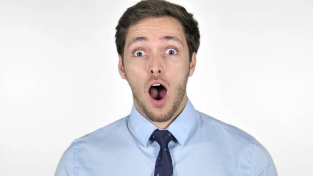 istock Shocked Young Businessman on White Background 1341849994