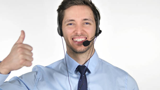 istock Thumbs Up by Young Call Center Agent on White Background 1341850169