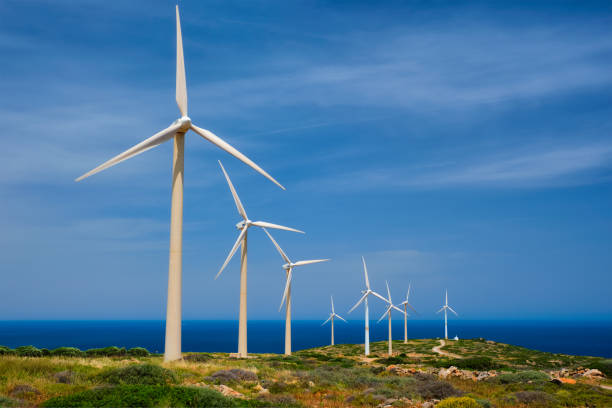 turbiny wiatrowe. kreta, grecja - aerogenerator zdjęcia i obrazy z banku zdjęć