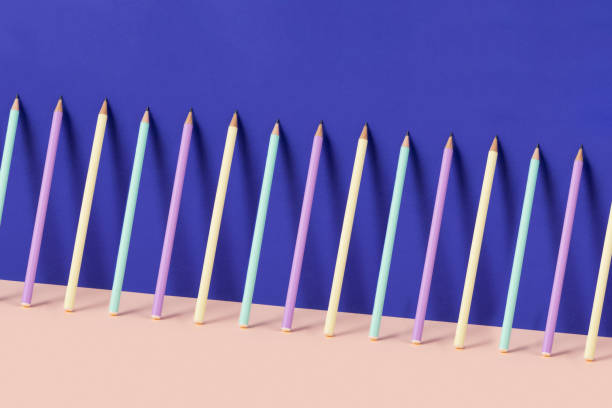 istock Pencils Leaning on Purple Wall 1341852929