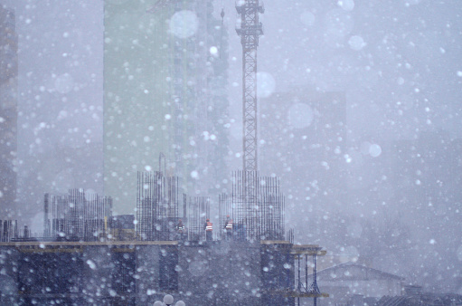 Construction during snowfall