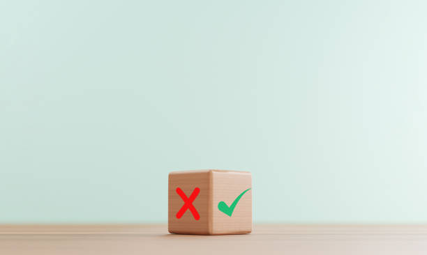 istock Right mark print screen on bright side and wrong mark on dark side of wooden cube block for correct and mistake in the same thing concept by 3d rendering. 1341855752