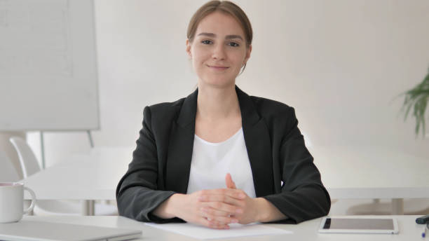 istock Young Businesswoman Talking with Customer, Webinar 1341860226