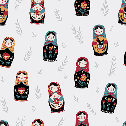Seamless pattern with colorful Russian dolls and leaves. Matryoshka background.