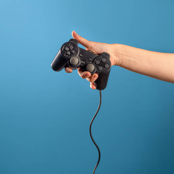 istock Play computer games, a hobby is computer video games, a joystick in your hand. 1341862512