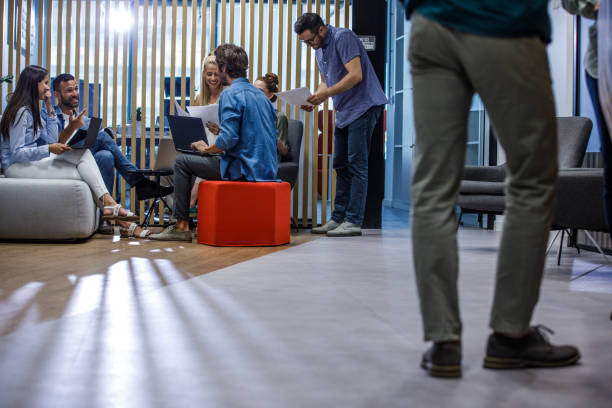 istock Business people co-working on a project in the office lobby 1341862932