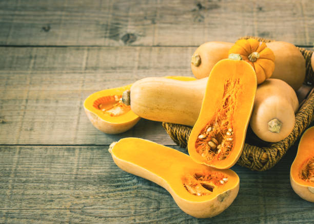 istock Fresh butternut squash on the wooden table 1341864157