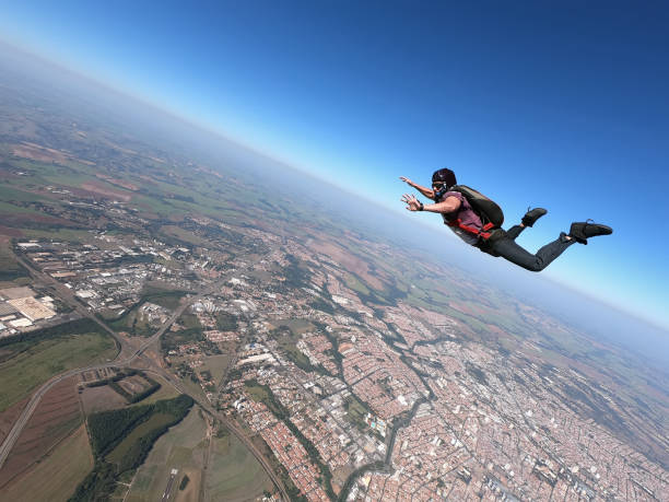 istock Classic skydiver body position in free fall. 1341864174