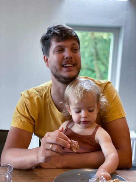 istock Proud daddy with baby girl 1341866416