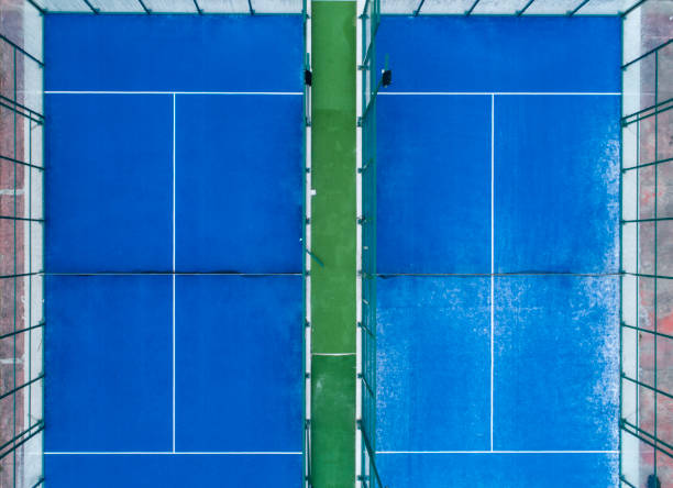 istock Two paddle tennis courts seen from above 1341868539