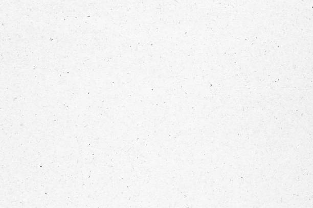 istock White paper or cardboard texture with black spot background. 1341868691