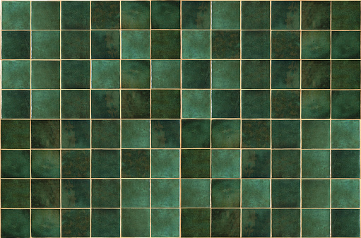 Green ceramic tile background. Old vintage ceramic tiles in green to decorate the kitchen or bathroom