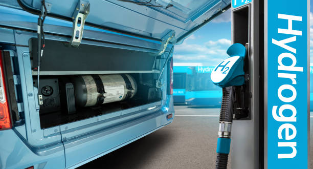 Hydrogen gas station and bus with an open hood and a hydrogen cylinder inside stock photo