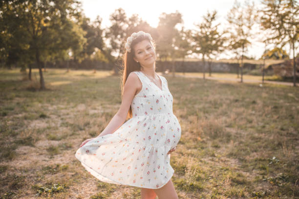 istock Gorgeous future mother enjoying the nature 1341875788