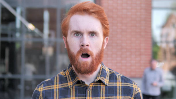 istock Wondering Redhead Beard Young Man in Shock, Outdoor 1341876033