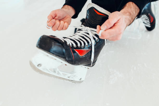 istock A man in hockey skates on ice 1341876078